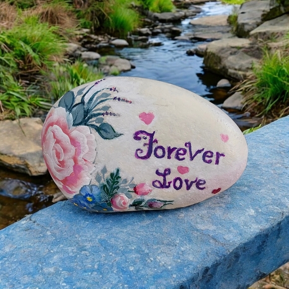 Painted LOVE river rock with rosy- peach roses, blue accent flowers, and hearts - Picture 13 of 17